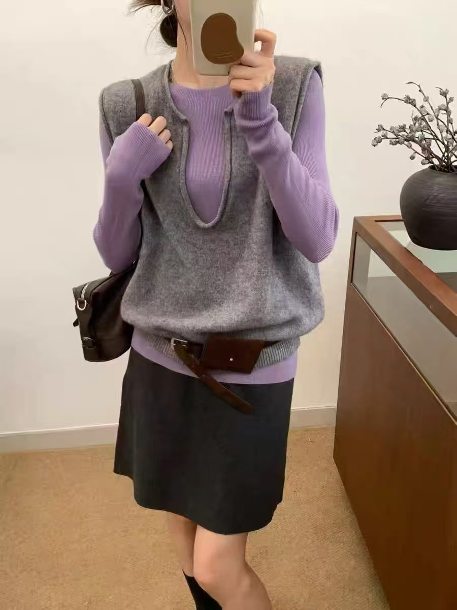Gray (depending on the color of the vest)