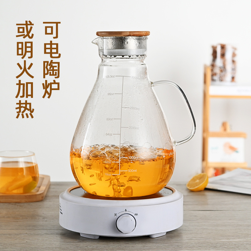 Botella de agua fría de vidrio resistente al calor del fabricante cubierta de acero inoxidable olla de jugo de gran capacidad botella de agua fría de vidrio transparente