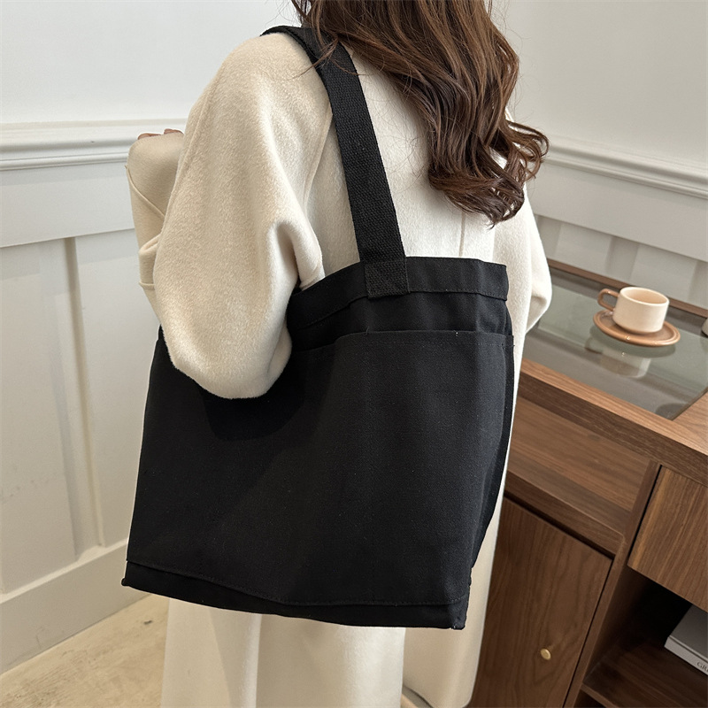 Invierno nuevo paquete de gran capacidad 2024, popular este año bolsas ociosas coreanas, bolsas de hombro de lecciones de reparación