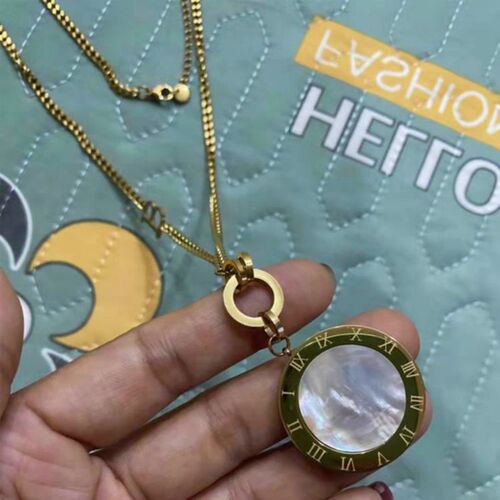 European and American fashionable titanium steel sweater chain long black and white round necklace for women, versatile and personalized autumn and winter clothing accessories