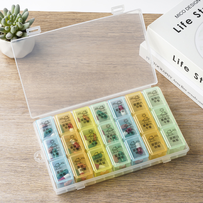 Caja de medicamentos portátil al por mayor de fábrica, caja de PP para el hogar, caja de medicamentos dividida para 7 días, caja sellada a prueba de olores, caja de medicamentos transparente portátil