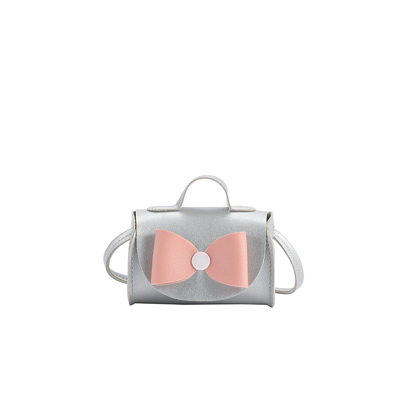 Bolsos para niños coreanos para niñas mini arco de botón bolsos de brazo pequeño bebé PU bolsos accesorios bolsa
