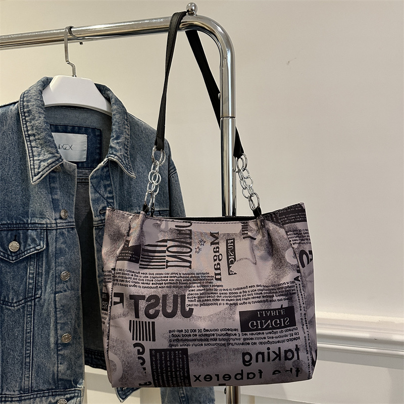 Bolsa de hombro de moda moda para mujeres 2025 nueva impresión de gran capacidad bolsa de mano simple de viaje bajo la axila