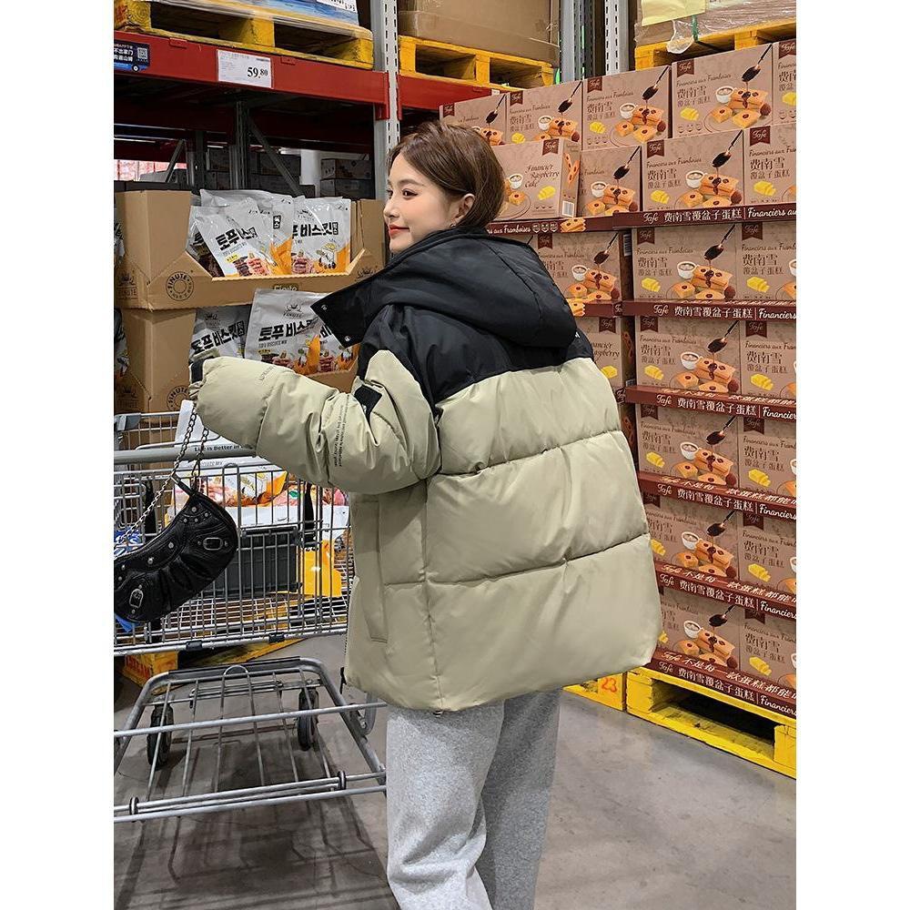 Comercio exterior invierno de 2025 nueva ropa de algodón de color grueso con sombrero de mujer ropa de algodón suelta ropa de pan chaqueta de algodón