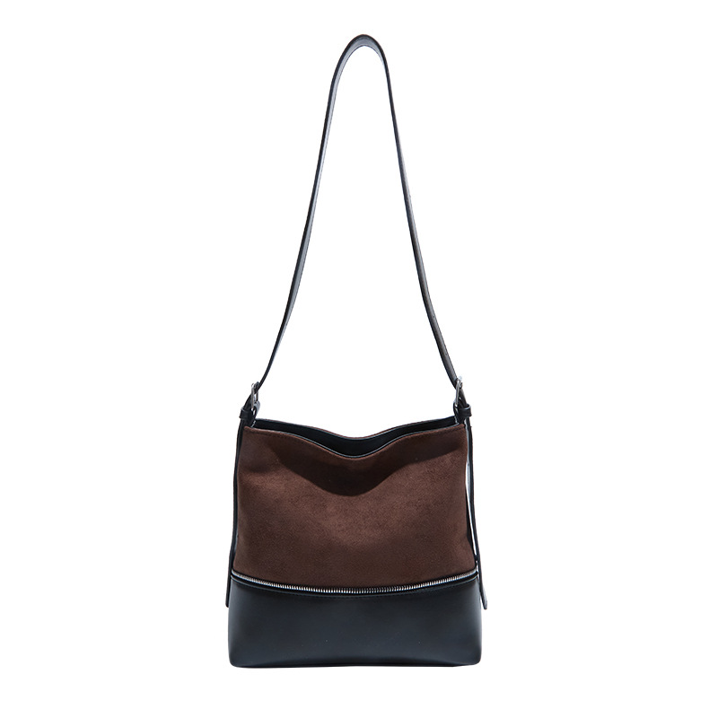 Otoño y invierno bolso de mujer 2025 nuevo retro bolso de cuero de seda empalmado bolso de cubo de agua de viaje universal mochila de hombro
