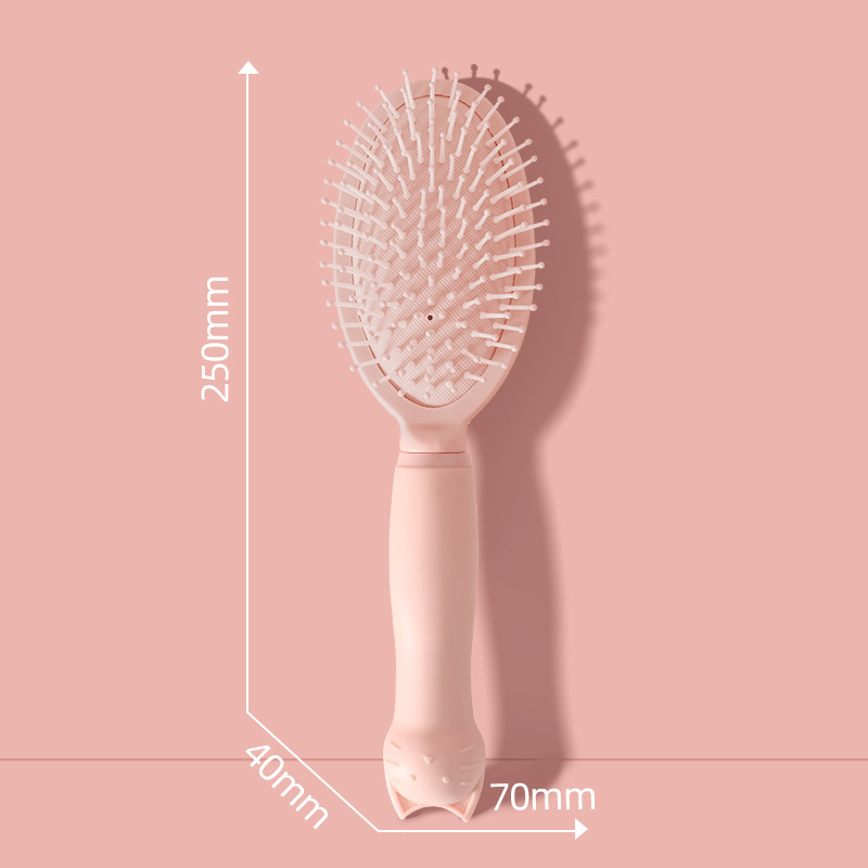 핑크 타원형 빗