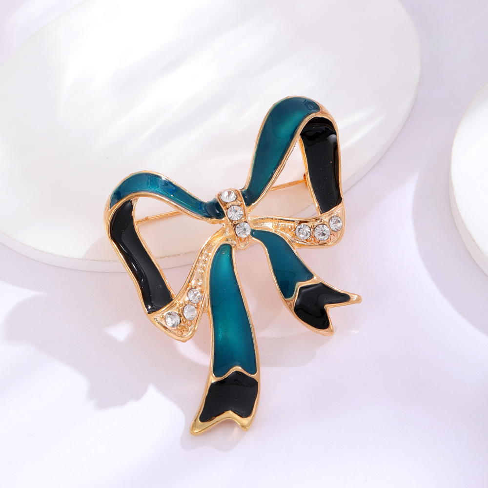 Elegant Bow Knot Alloy Enamel Plating Inlay Rhinestones Unisex Brooches display picture 5