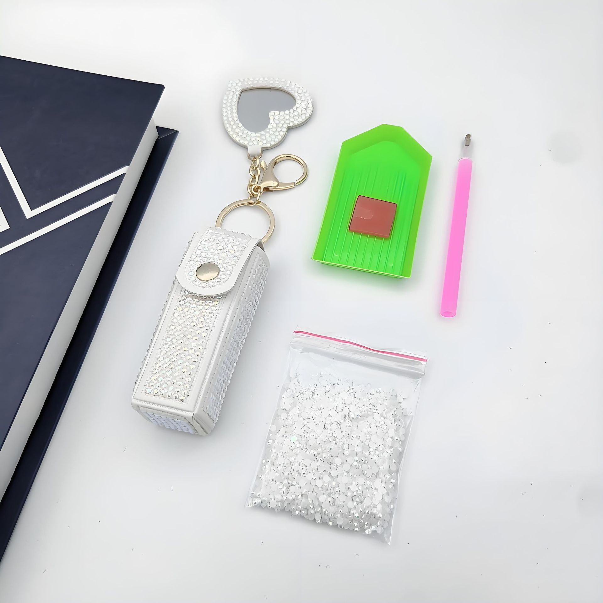 Bolso de cambio transfronterizo sobre rojo espejo creativo llavero colgante pequeño PU cuero bolso de coche accesorios accesorios en stock