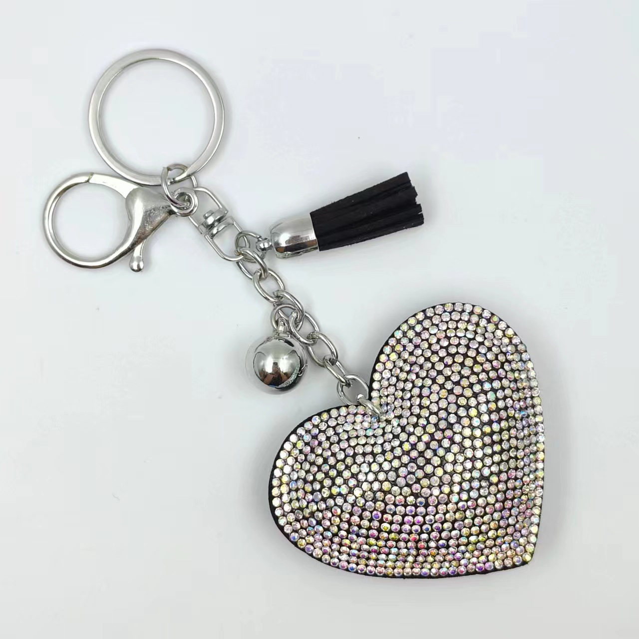 Estilo explosivo transfronterizo pequeño corazón de melocotón fragante llavero de cuero de diamantes calientes amor borla bolso colgante franela llave de diamantes