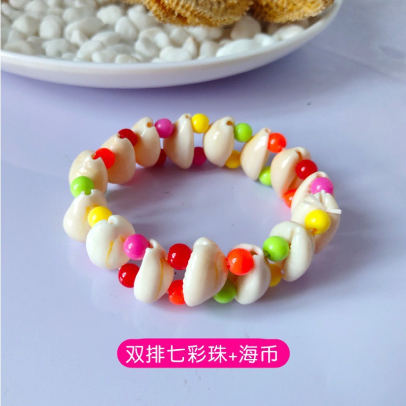 바다 동전과 두 줄의 화려한 구슬