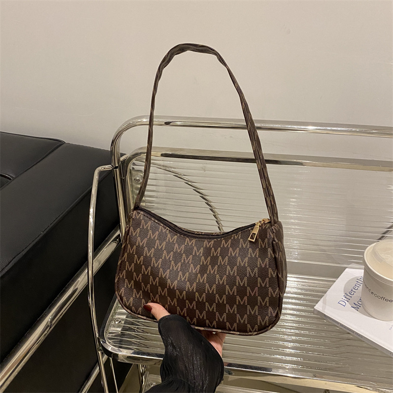 Bolsa de media luna impresa retro bolso de otoño nicho de diseño de estilo occidental 2024 nuevo bolso de hombro bolso de mano hermoso