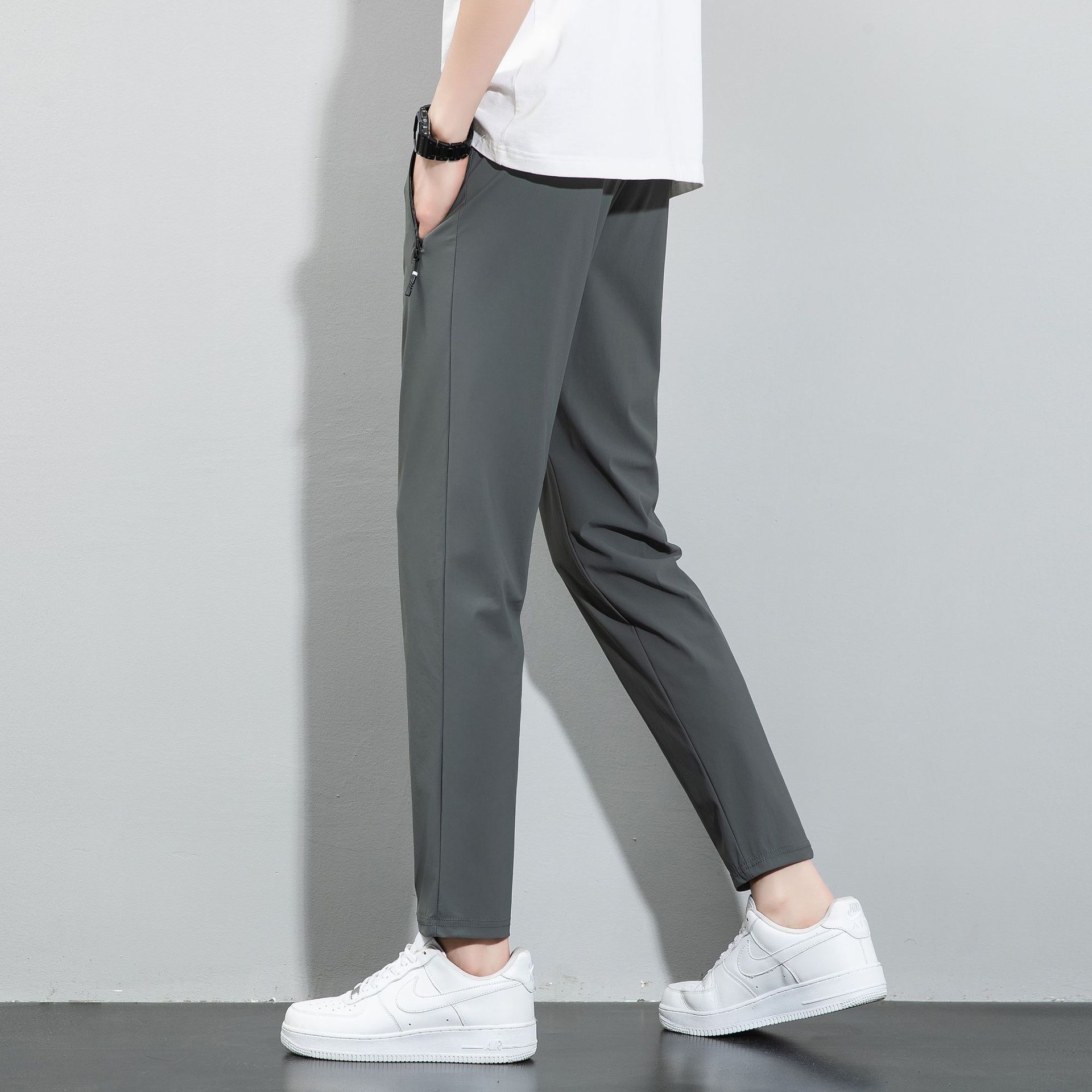 Pantalones de verano de hielo de tamaño grande para hombres pantalones deportivos de barril recto, piernas de ángulo plano sin quemar, secado rápido pantalones casuales al por mayor