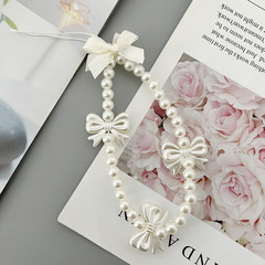 新款手機掛繩短款女創意蝴蝶結珍珠鏈手機殼掛鏈配件DIY包包裝飾