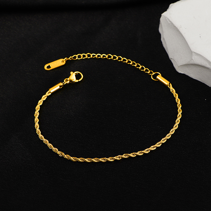 Flätat armband för kvinnor i titanstål lyxig minimalistisk_voghion.com