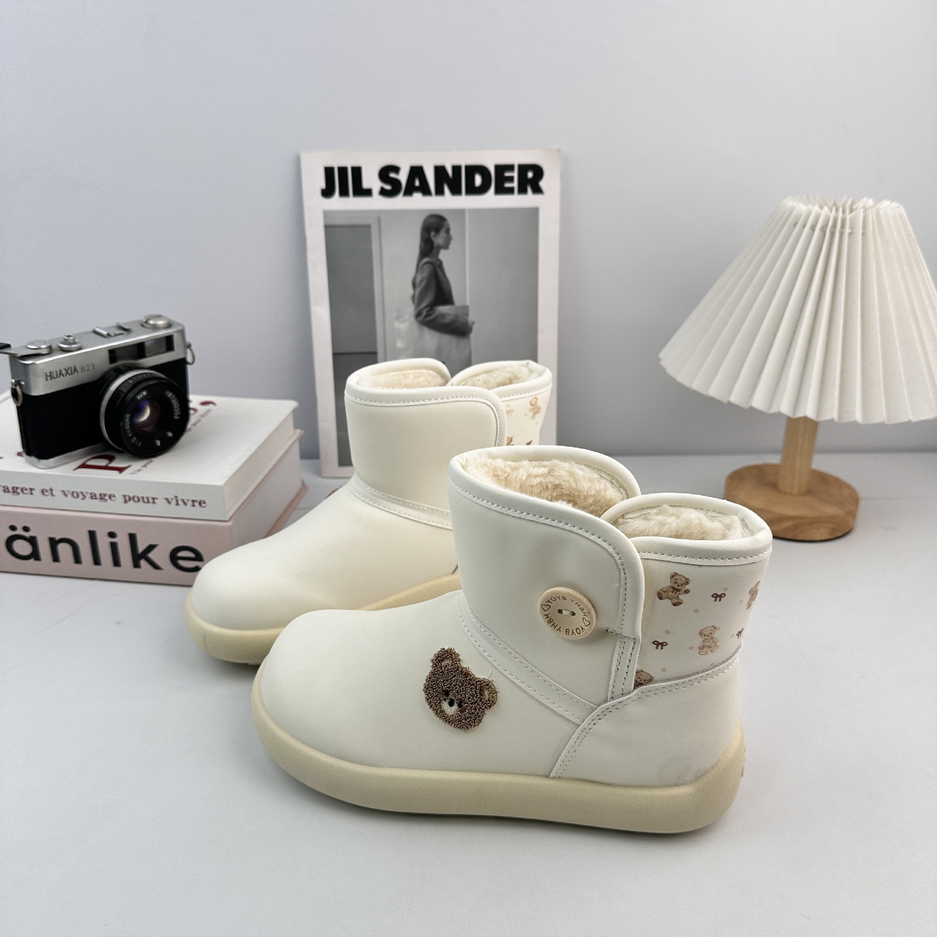 Zapatos de nieve de invierno de larga onda para mujeres 2025 nuevos zapatos de algodón de estilo coreano ligero y cálido con una base plana gruesa