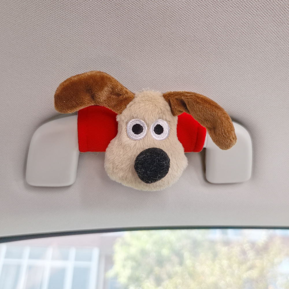 Perro de peluche maneja de automóvil maneja de automóvil masculino y femenino maneja de puerta interior cubierta guante de techo