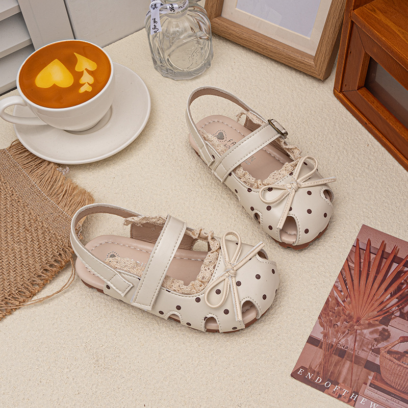 Niñas sandalias de verano 2026 nuevo estilo de moda infantil zapatos de princesa universal arco de encaje zapatos de moda Lefour