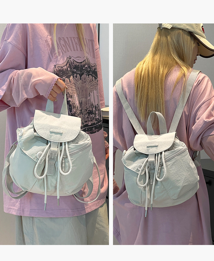 Colorful Fox's new Korean-style ins women's niche design lightweight pocket button drawstring backpack undefined