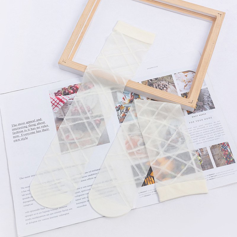 Calcetines de mujer JK estilo adulto calcetines de becerro ins diamante Cruz color sólido blanco y negro transparente medias altas medias al por mayor