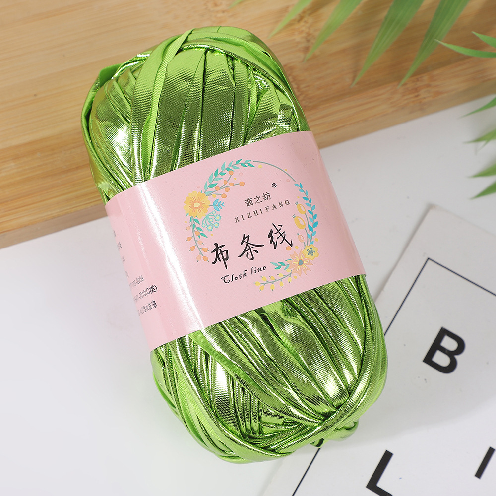 Línea textil Qian Zhi hilo de color mágico tejido a mano hilo de fantasía de color bricolaje en stock fábrica al por mayor