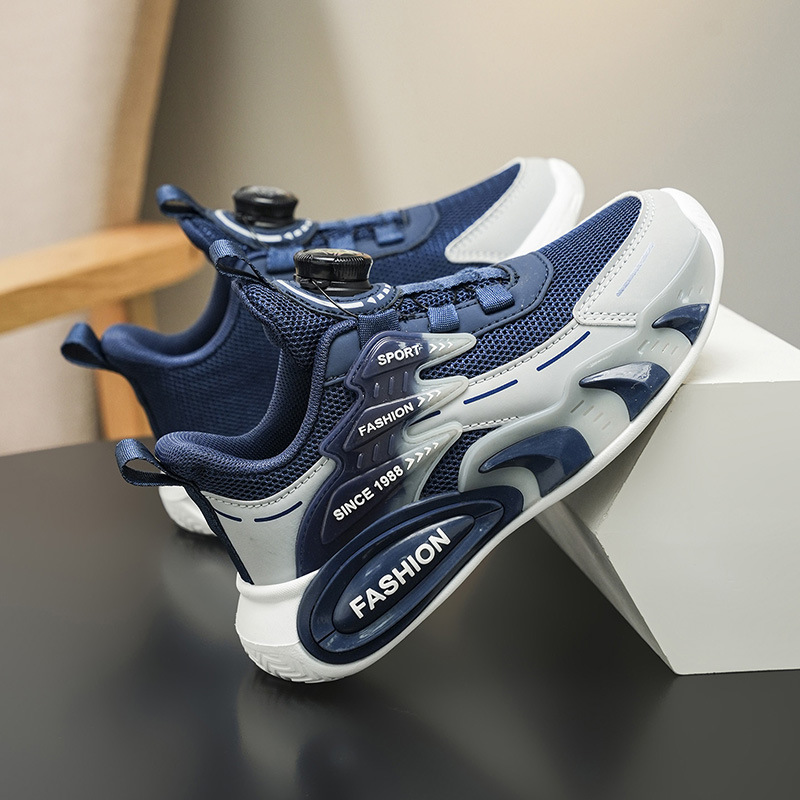 Zapatos de botón giratorio para niños primavera y otoño zapatos de malla transpirables para niños zapatos de corrida de moda universal al por mayor