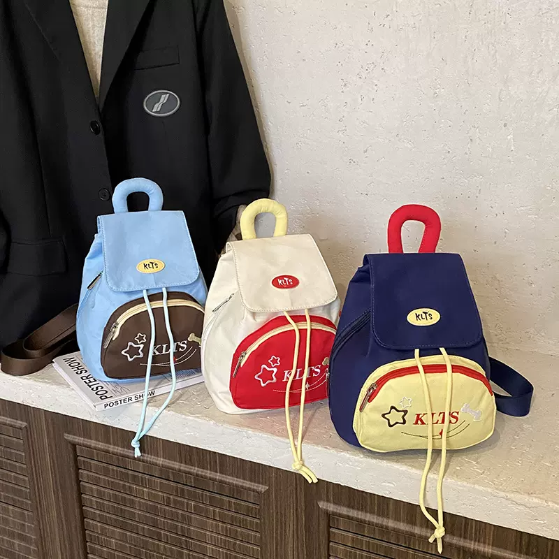 冬日多巴胺纽扣书包2025新款潮可爱双肩包迷你撞色小包包出游背包