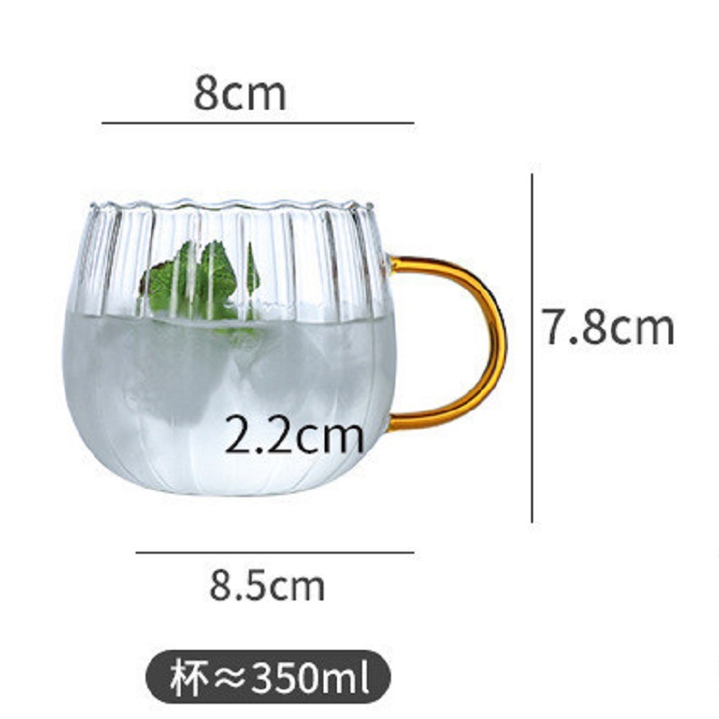 Taza de gota de agua de rayas de mango amarillo