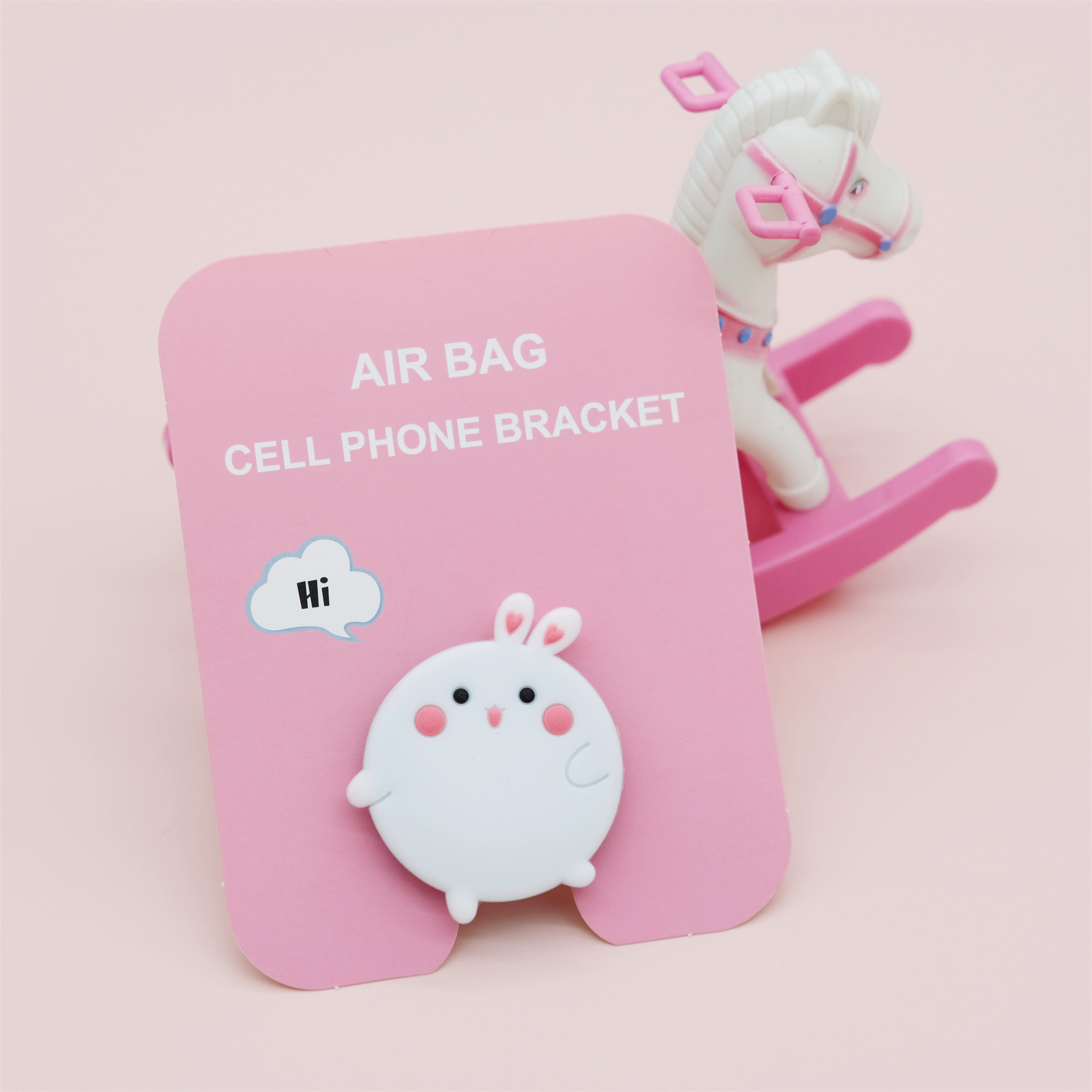 Airbag de dibujos animados soporte de teléfono móvil retráctil creativo personalizado escritorio plegable adhesivo perezoso soporte pequeño multifuncional