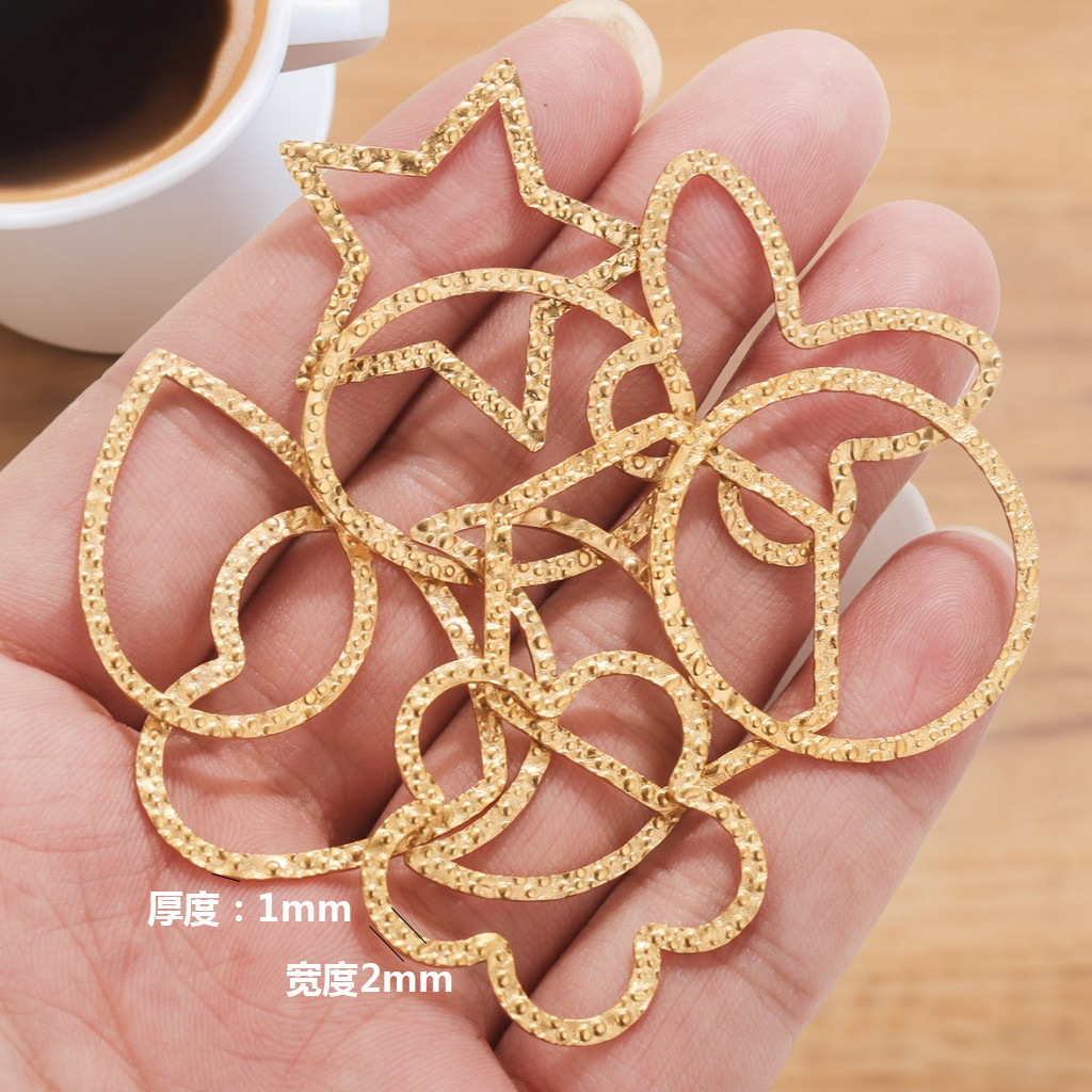 Geométrico marco retorcido en relieve joyería DIY accesorios joyería corazón de桃ar estrella luna anillo hexagonal pendientes de acero titanio