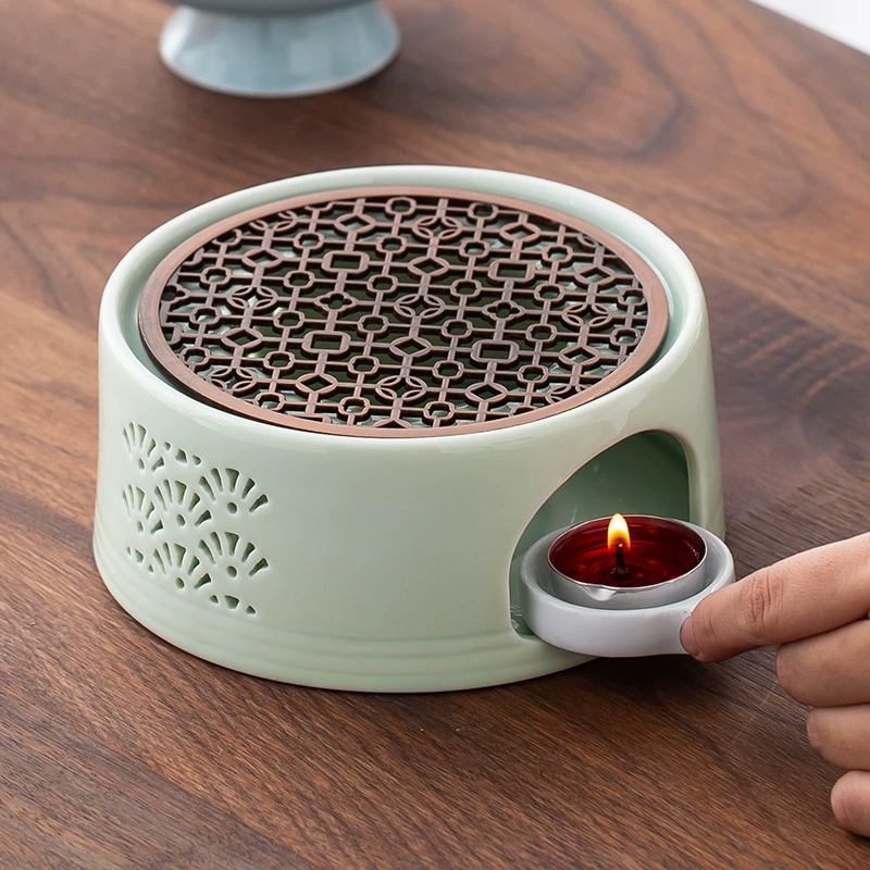 Тёплая чайная плита Цветочный чайник Свеча чайная плита Керамическая основа нагревательной печи Ресторан отеля Жареные апельсины согревают чай