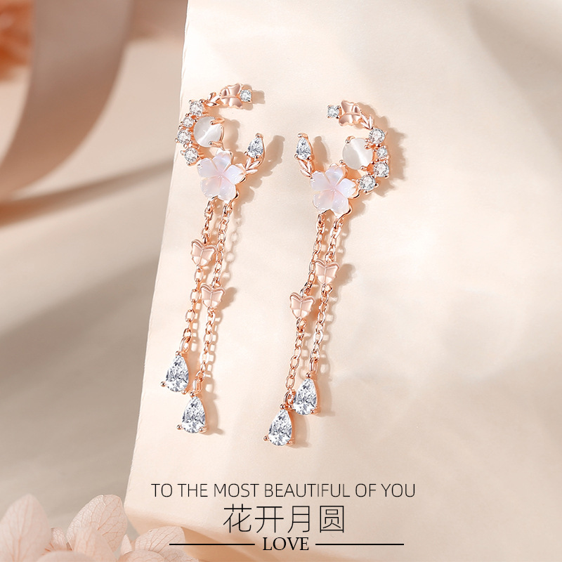 Estilo coreano s925 plata nicho diseño asimétrico Luna pendientes borla pendientes joyería al por mayor Garland pendientes