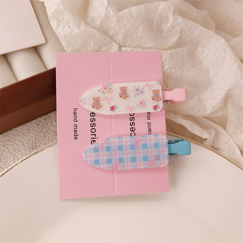 Un par de impresión de arco para niñas pinzas de cabello sin marcas de dibujos animados para mujeres adorables pinzas de cabello para el cabello de bordas rotas