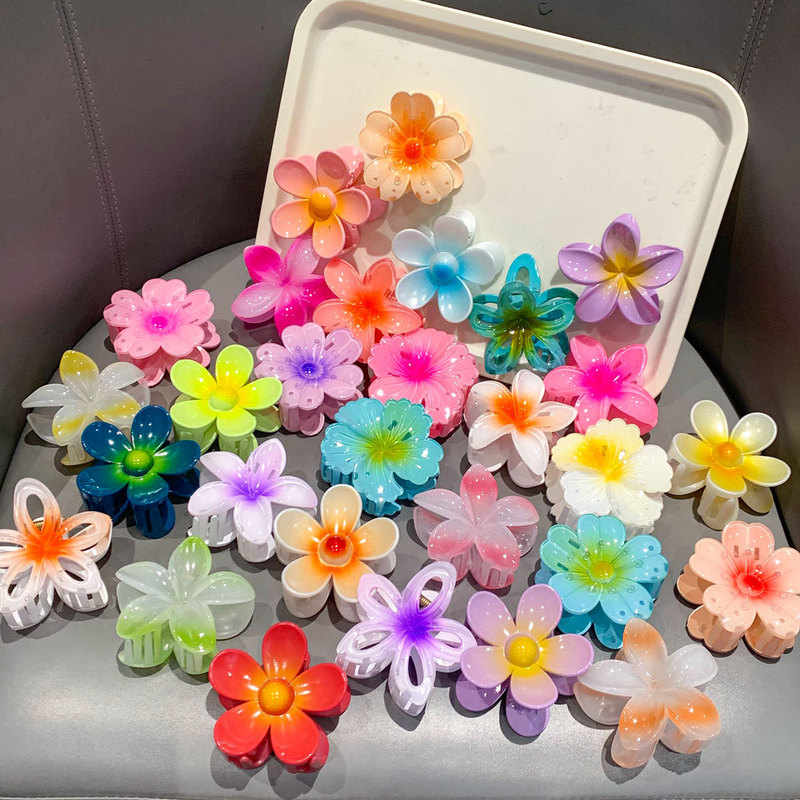 クロスボーダーの人気卵の花は紫荊花のヘアピンの側をつかんで後頭部をつかみます。|undefined