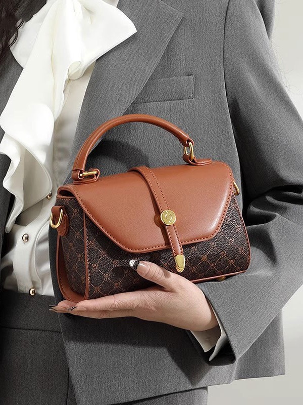 Bolso retro europeo y americano 2025, nuevo bolso de moda, bolso de mujer, bolso de impresión de otoño y invierno, bolso de mujer, lujo ligero, un cabello