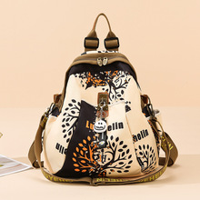 潮酷喷涂发财树双肩女包包英伦风复古大字母俩用旅行背包潮大书包