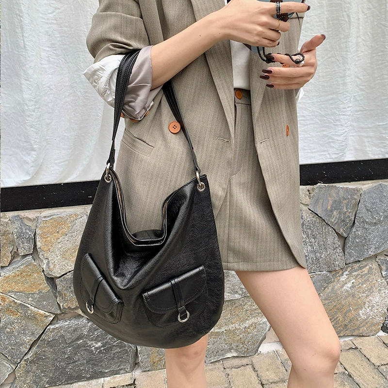Spring shoulder bag, leather capacious one-shoulder bag, trend of season, cowhide, high-end