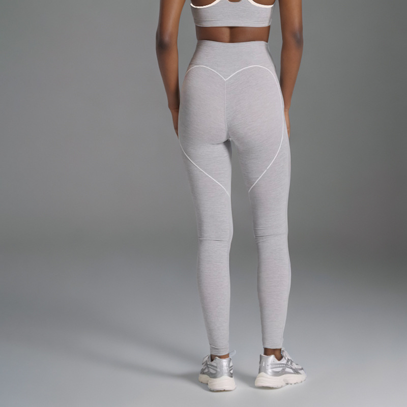 Procesamiento personalizado OEM comercio exterior europeo y americano transfronterizo belleza espalda deporte contraste color sujetador melocotón cadera alta cadera elástica pantalones de yoga
