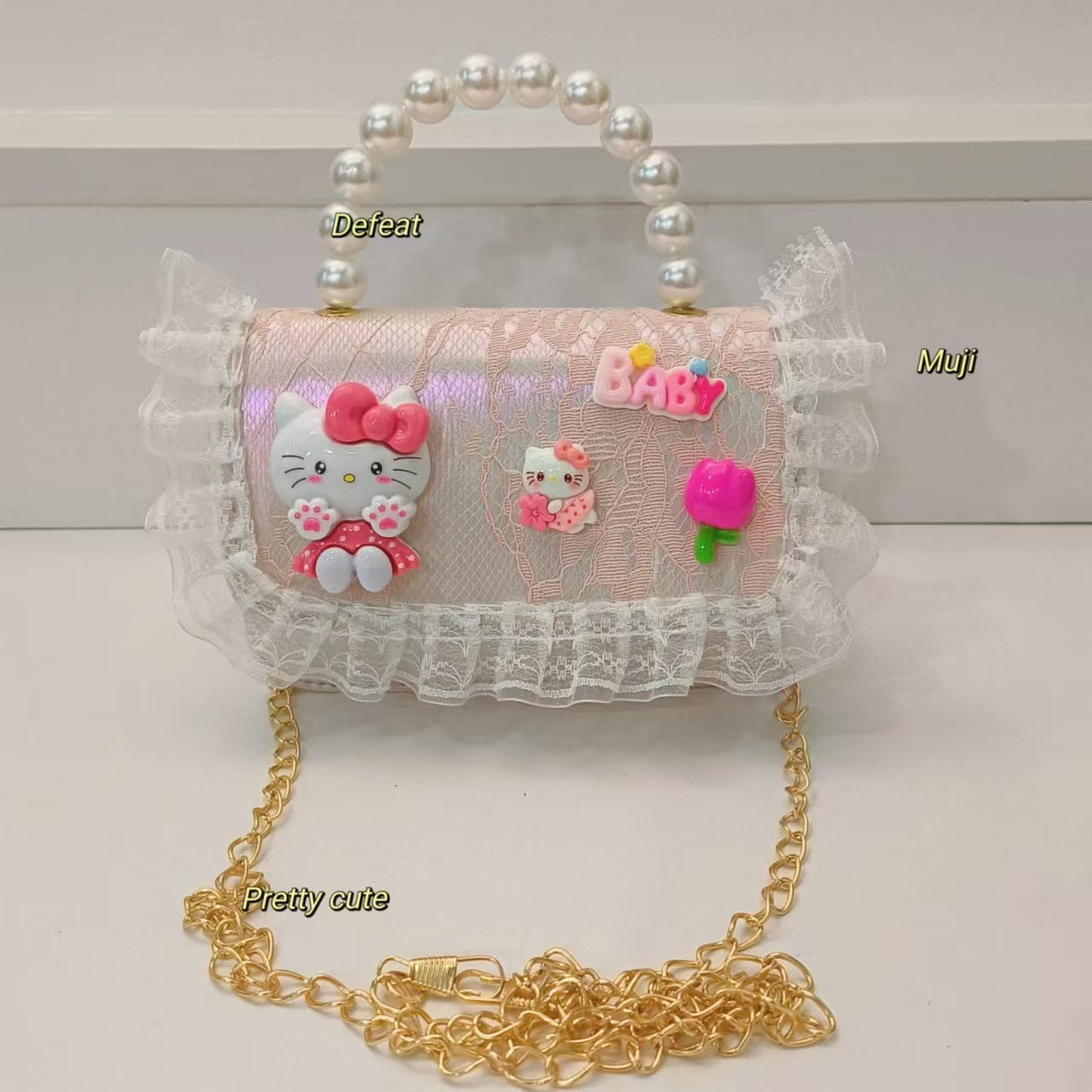 Cartoon KT feline bolso bolso de perla bolso de hombro mochila bolso de cambio bolso de cadena bolso pequeño bolso cuadrado bolso para niños