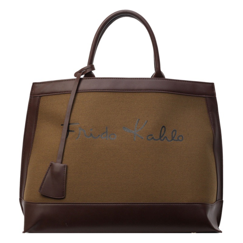 Retro de alta calidad portátil de gran capacidad para las mujeres 2024 nueva moda lienzo contraste color viajero hombro bolsa