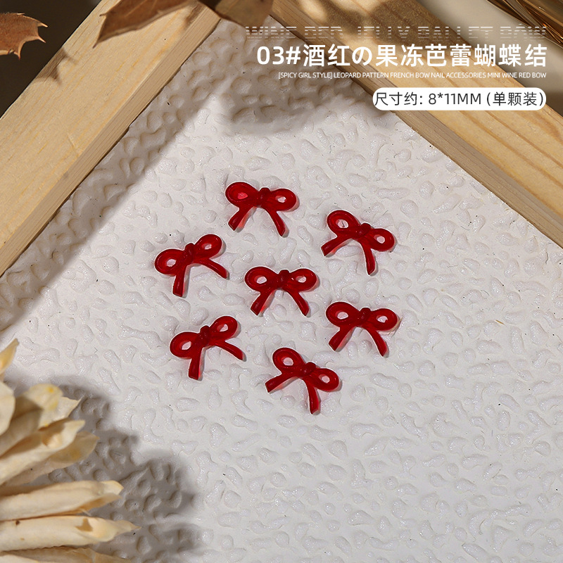 Hot Girl estampado leopardo arco francés joyas de resina de manicura vino rojo mini arco decoración de uñas al por mayor