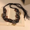 3 # Bronze crescent tassel brown round beads dark brown leather cord about 150cm long