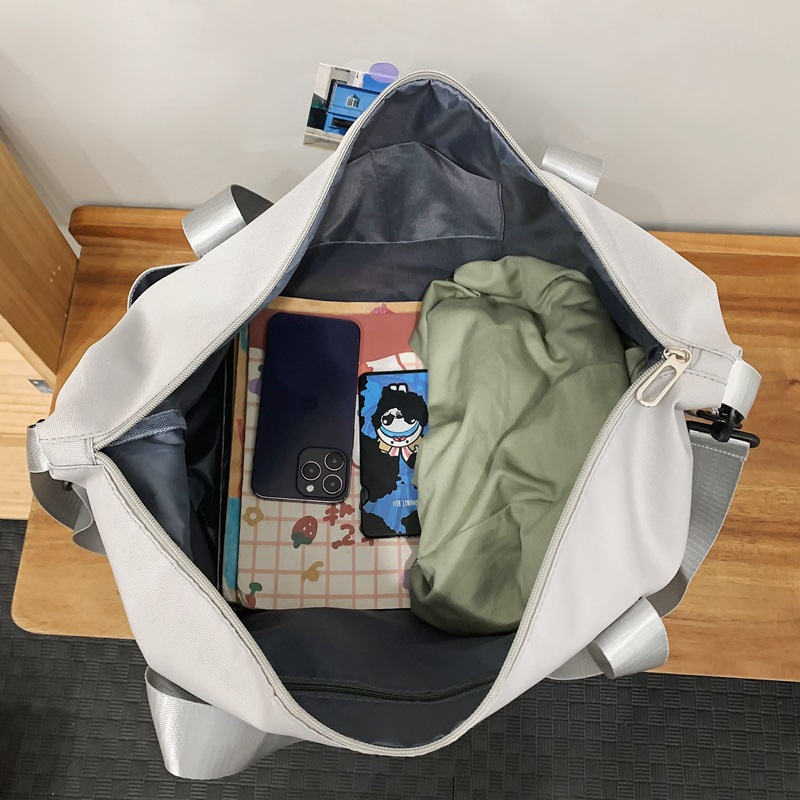 Comercio exterior al por mayor nueva bolsa de viaje de gran capacidad de separación seca y húmeda moda femenina color contraste viaje al aire libre almacenamiento bolsa de equipaje