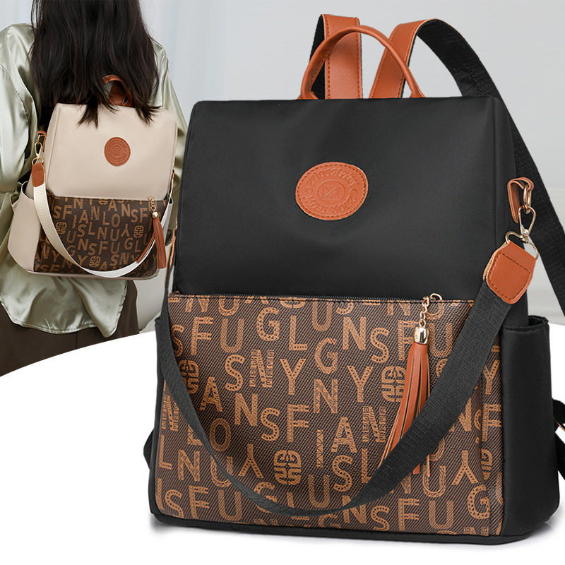 2024 nueva moda contraste color damas mochila antirrobo simple viaje de gran capacidad mochila multiusos al por mayor