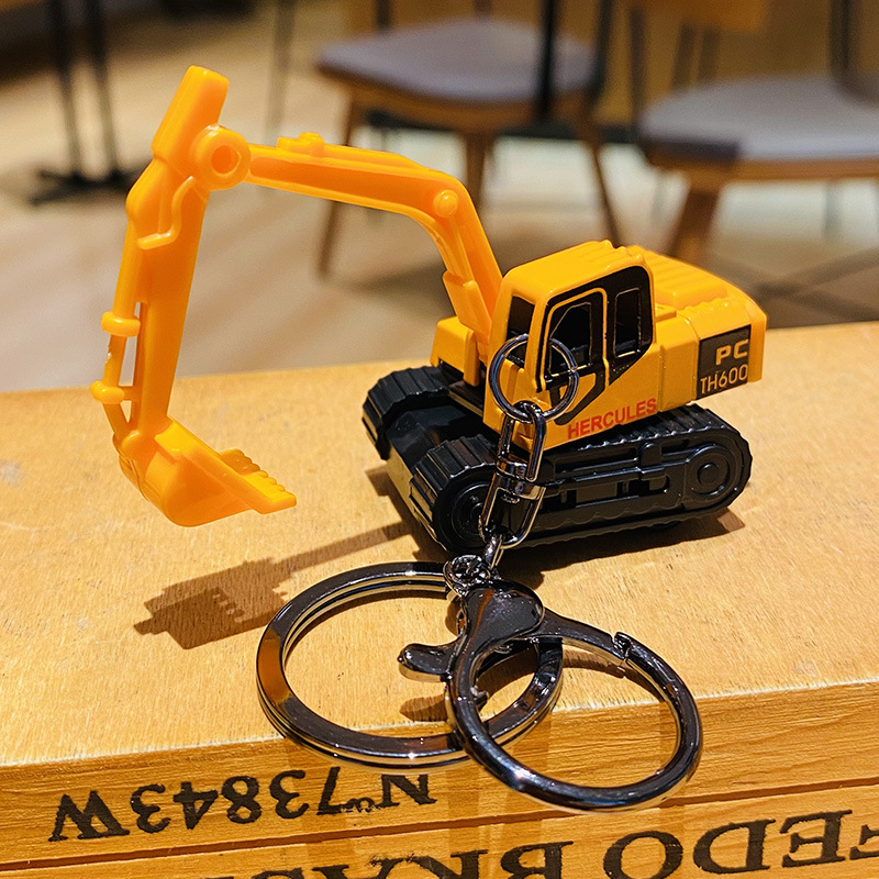 Creativo de dibujos animados aleación ingeniería vehículo excavadora llavero exquisito lindo bolsa colgante par pequeño regalo al por mayor