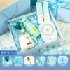 Blue automatic ceramic spoon, postcard with butterfly, flashing light
