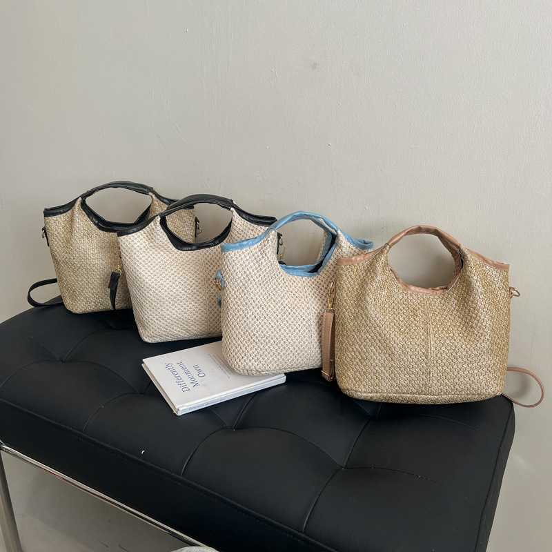 2025 este año popular bolsas de tejido de mano de mujer moda de estilo extranjero bolsa de hombro bolsa de viaje de playa bolsa de paja