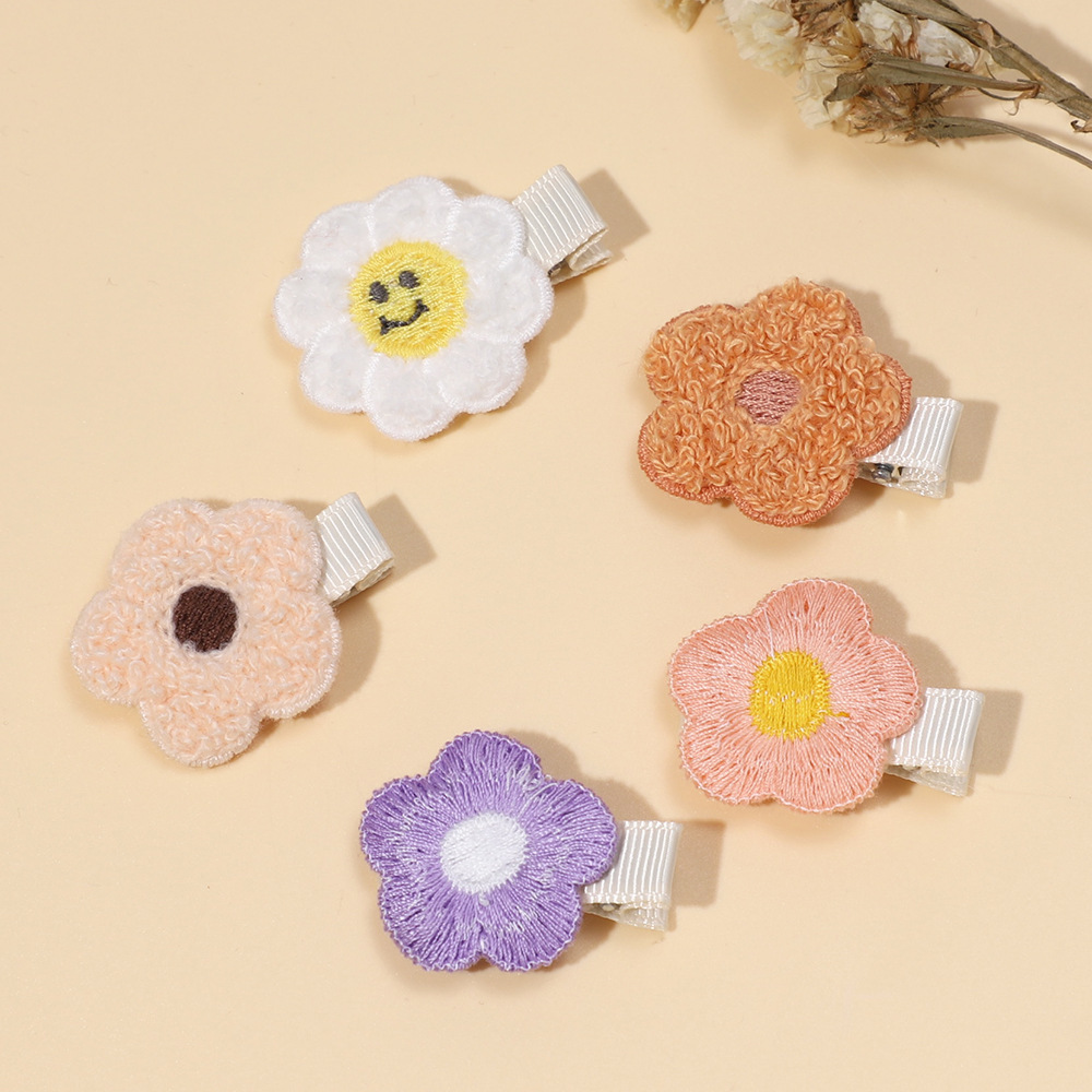 Foreign trade new children's hairpin European and American cute baby five-petal flower side clip girl's flower does not hurt hair full bag hairpin_voghion.com