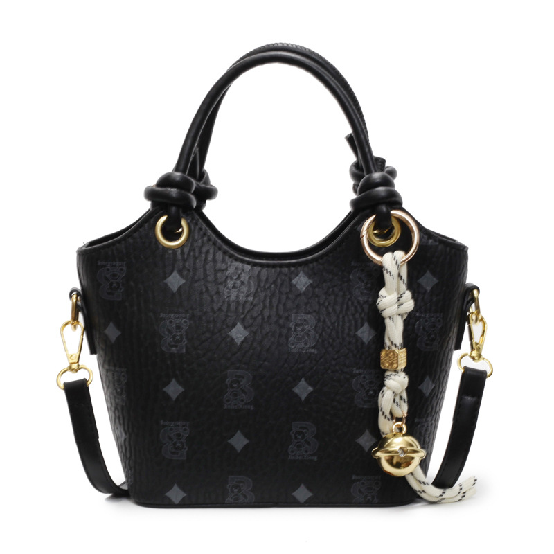 Tendencia impresa bolso de cubo de mano mujer 2025 nueva moda textura versátil bolso de hombro super caliente bolso de mochila