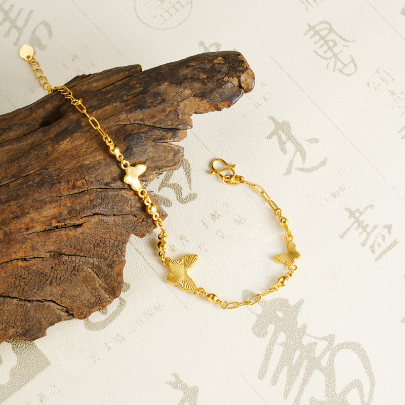 Tobillera de oro de arena de Vietnam, flash, mariposa láser, accesorios femeninos con cuentas, joyería de diseño de nicho de lujo ligero, Yiwu al por mayor