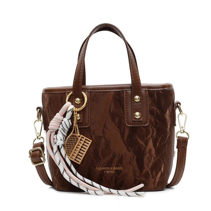 Comercio exterior explosión bolso de cubo de mano mujer 2025 nuevo simple bolso de hombro casual red explosión bolso de mochila coreano